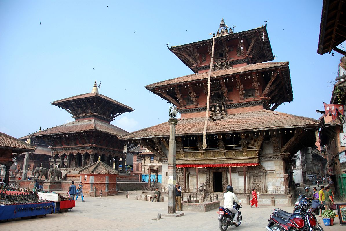 Kathmandu Patan Durbar Square 23 Vishwanath Temple and Bhimsen Temple With Lion Column 